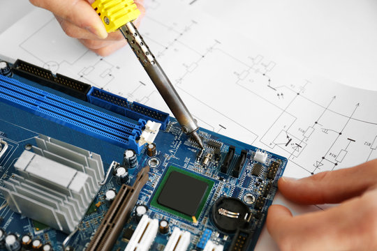 Man hands repair computer parts