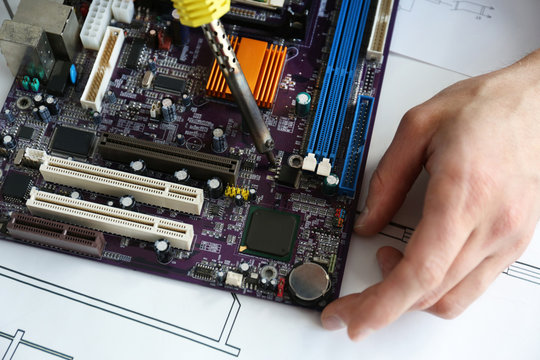 Man hands repair computer parts
