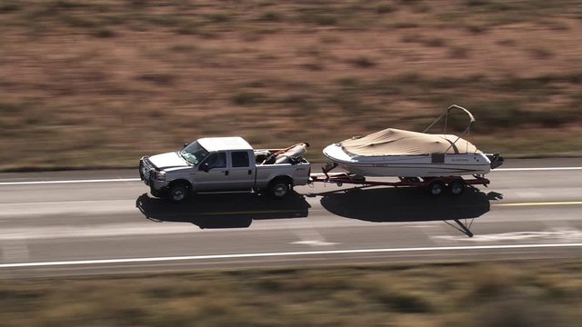 Flight keeping pace with a truck near Page, Arizona