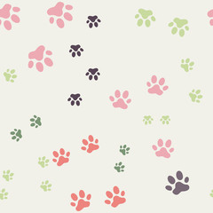 Colorful seamless pattern with cat footprints. on a gray background