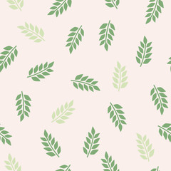 Green leaves pattern. Abstract vector pattern on the light pink background. 