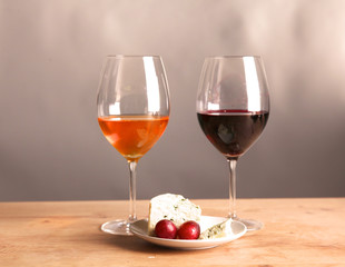 on the table a bottle of wine and a glass of