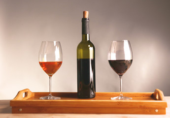 on the table a bottle of wine and a glass of