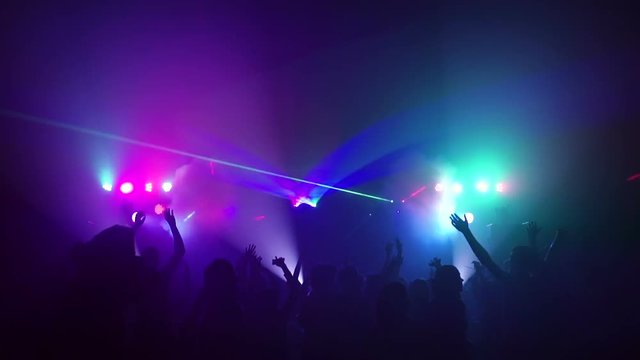 Young people dancing in night club. slow motion