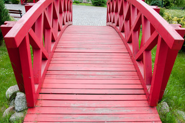 Obraz premium Red wooden bridge closeup