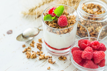 Granola with rasberry and yogurt in glass