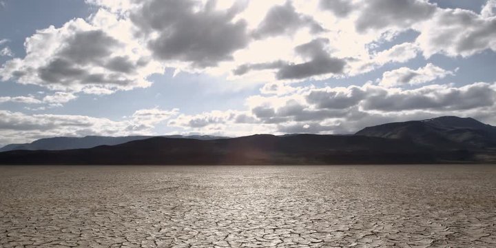Cloudy sky above parched alkali flats