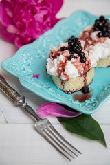 Breakfast of sandwiches with cheese and jam from blueberries.