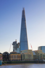 Fototapeta na wymiar City of London and Shard of glass building. View from the South bank of the river Thames at sunset. 