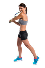 Pretty woman playing tennis