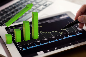 growth graph on digital tablet