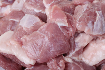 A close-up of the fresh lamb meat with chopsticks