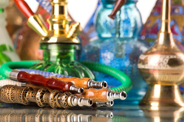 Group of eastern hookahs on white background