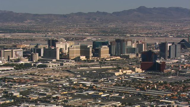 Wide orbit of Las Vegas with high-rise casinos in mid-frame. Shot in 2008.