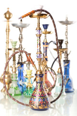 Group of eastern hookahs isolated on white background