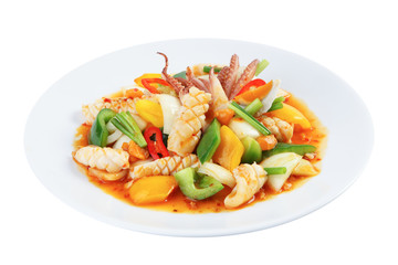 Stir-fried squid with salted egg yolk isolated on white