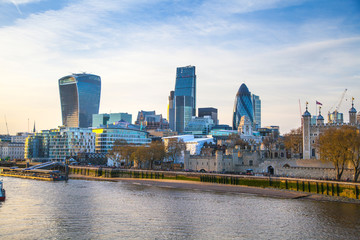 LONDON, UK - APRIL 15, 2015:  City of London view from the South bank of the river Thames at sunset. 