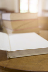 old book with blur library background