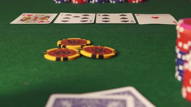 POKER: Player thinks and throws a playing chips