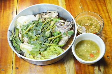 steam mango fish with vegetable in stainless steamer pot and sauce