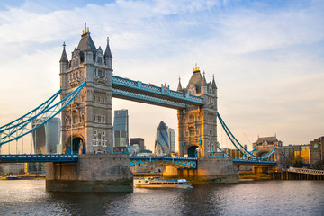 Fototapeta na wymiar LONDON, UK - APRIL 15, 2015: Tower Bridge and River Thames at sunset 