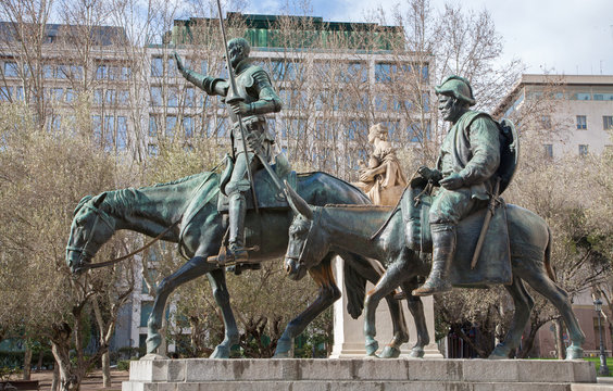 MADRID - MARCH 10: Don Quixote and Sancho Panza statue from Cervantes memorial by sculptor Lorenzo Coullaut Valera (1925 - 1930) on Plaza Espana on March 10, 2013 in Madrid