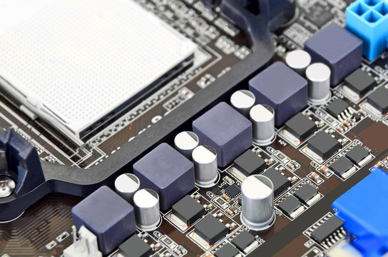 Printed computer motherboard board with microcircuit, close-up