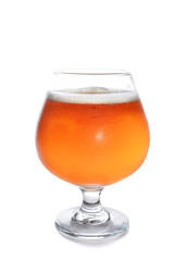 misted glass of cold beer on a white background