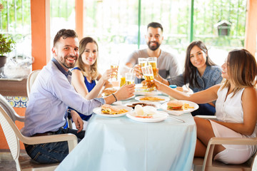 Friends at a barbecue drinking some beer