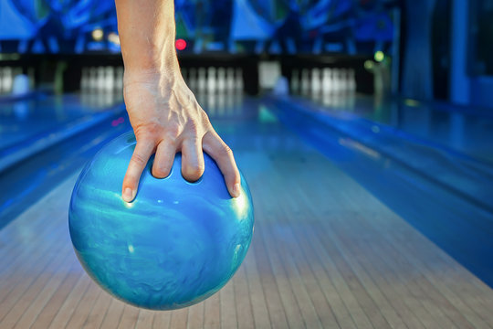 hand holding a bowling ball