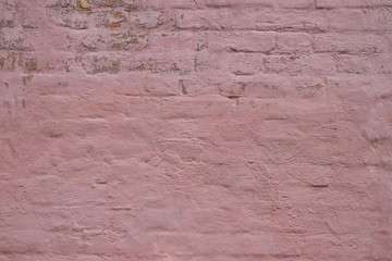 Pink painted brick wall background