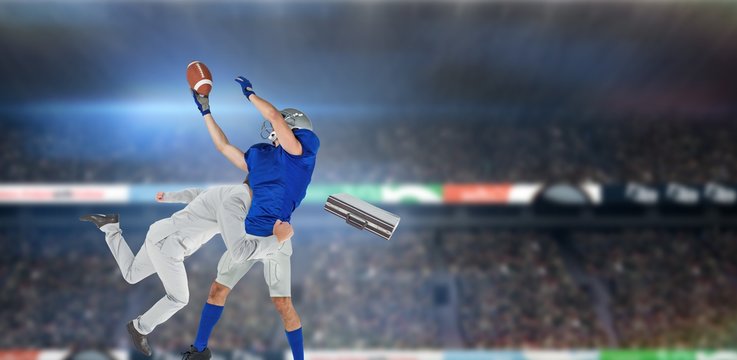 Composite image of businessman tackling a football player
