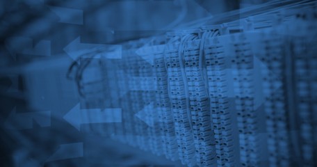 Composite image of blue arrows on black background