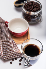 coffee cup /red cup on wooden tray/Plaid fabric and coffee bean