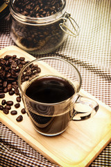 coffee cup on Plaid fabric Vintage style