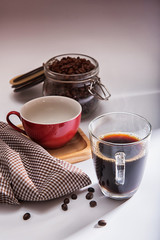 coffee cup /red cup on wooden tray/Plaid fabric and coffee bean