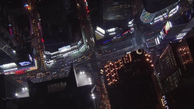 Night flight over 45th Street, looking down at Times Square. Shot in 2005.