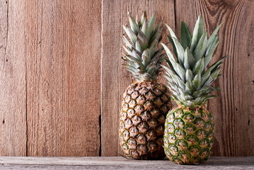 Two pineapple on the table