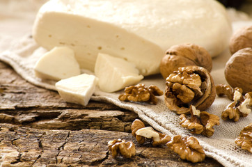 A farmer's Breakfast. Cheese and nuts. A rustic style.