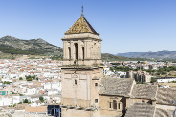 Fototapeta na wymiar Sta Maria church and a view over Alcaudete city, in the province of Jaén, Spain
