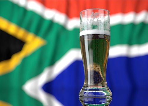 a glass of beer in front a south african flag. 3D illustration rendering.