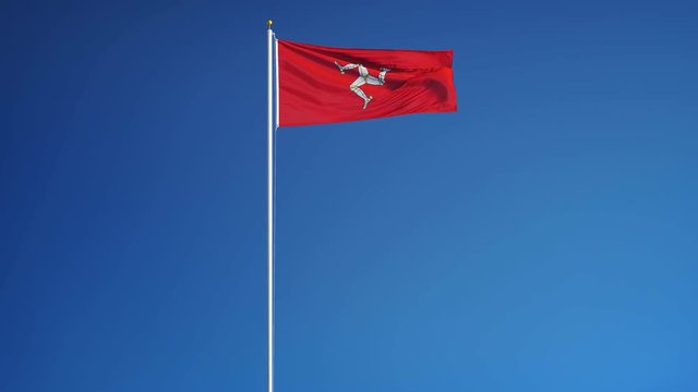 Isle of Man flag waving in slow motion against blue sky, seamlessly looped, long shot, isolated on alpha channel with black and white luminance matte, perfect for film, news, digital composition