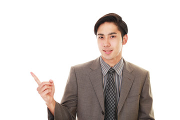 指示する笑顔のビジネスマン
