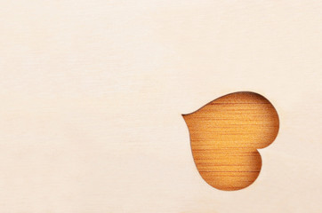 Heart on wooden background