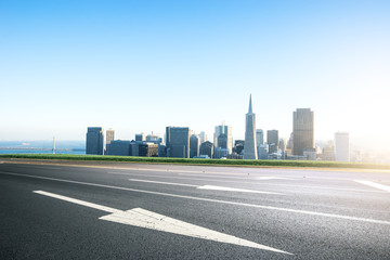 empty road with cityscape and skyline of san francisco in sunny