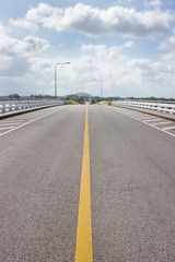 road on the bridge and many clound in sky