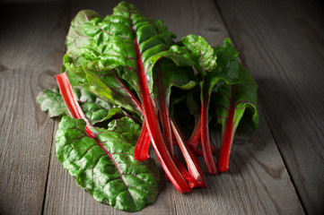 Swiss chard on wood