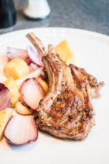 Grilled lamb rack steak