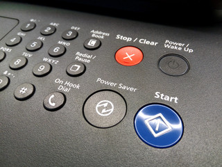 laser printer, power saver button, on large printer plotter.