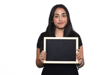Latin woman holding chalkboard.